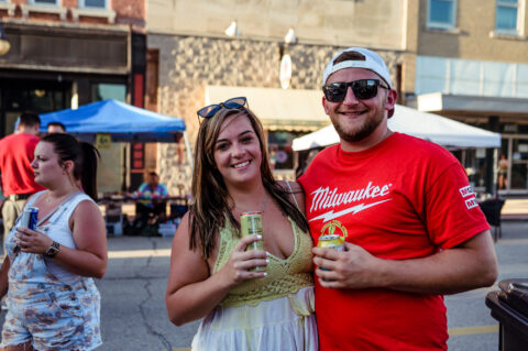 couple taking a picture in downtown pekin